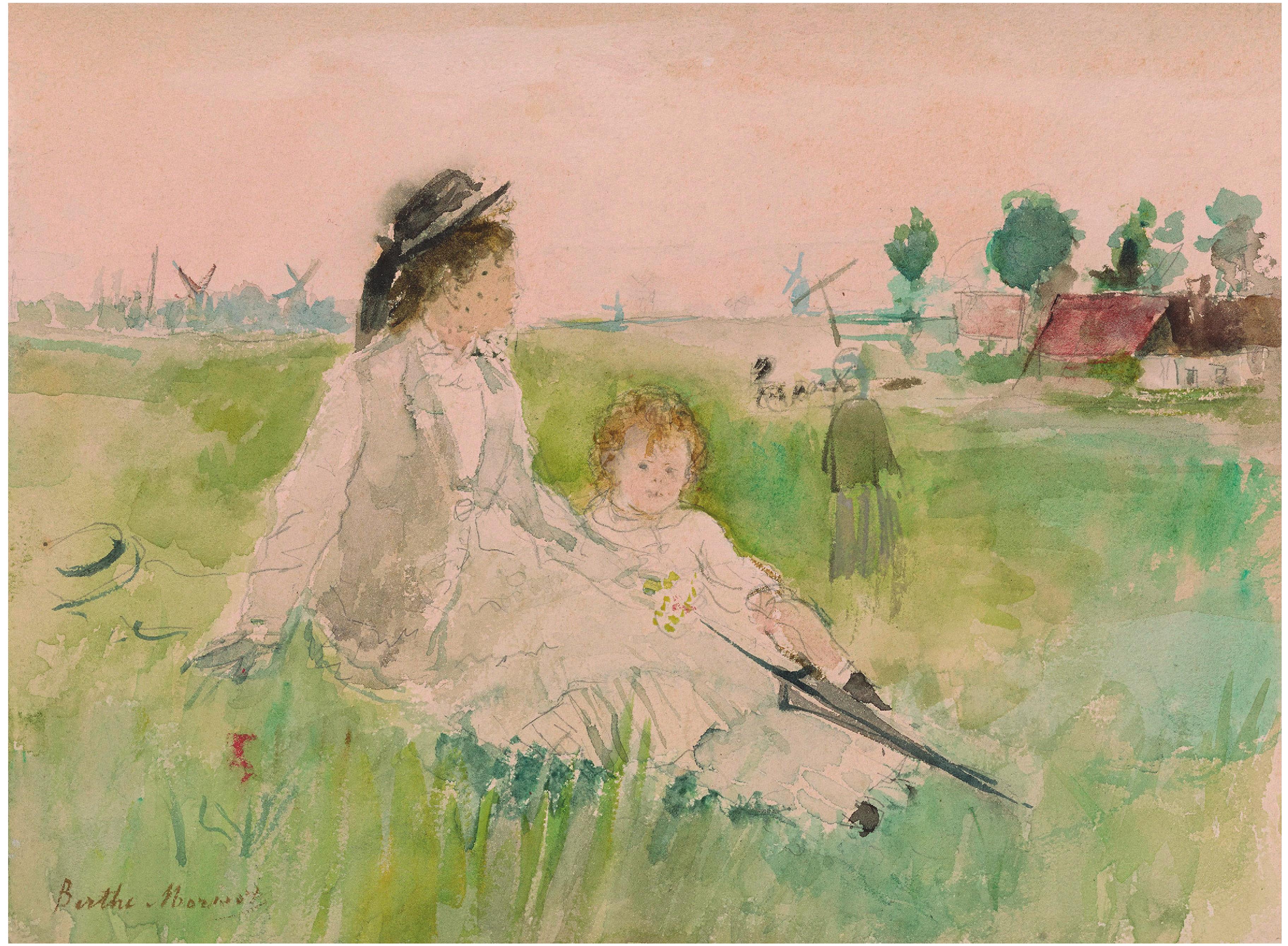 坐在草地上的女人和孩子